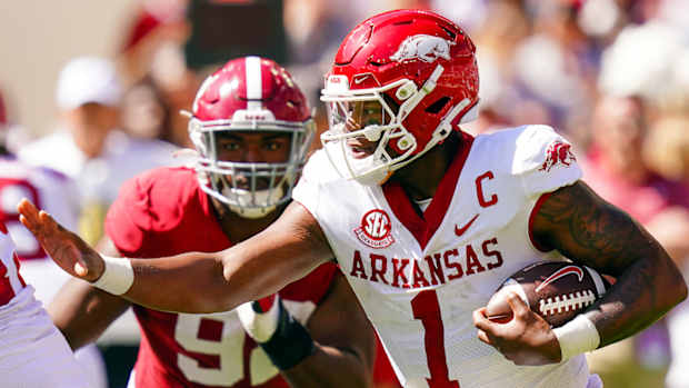 Razorbacks quarterback KJ Jefferson scrambling for yardage against Alabama